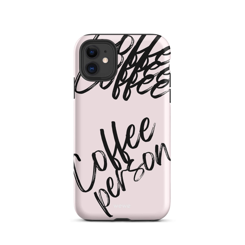 Custom iPhone case 11 with a light pink background and black brush script text that says 'Coffee Person'.