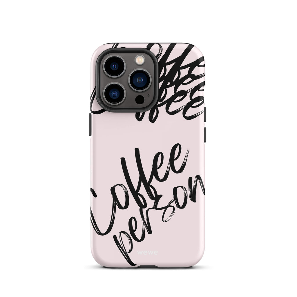 Custom iPhone case 13 pro with a light pink background and black brush script text that says 'Coffee Person'.