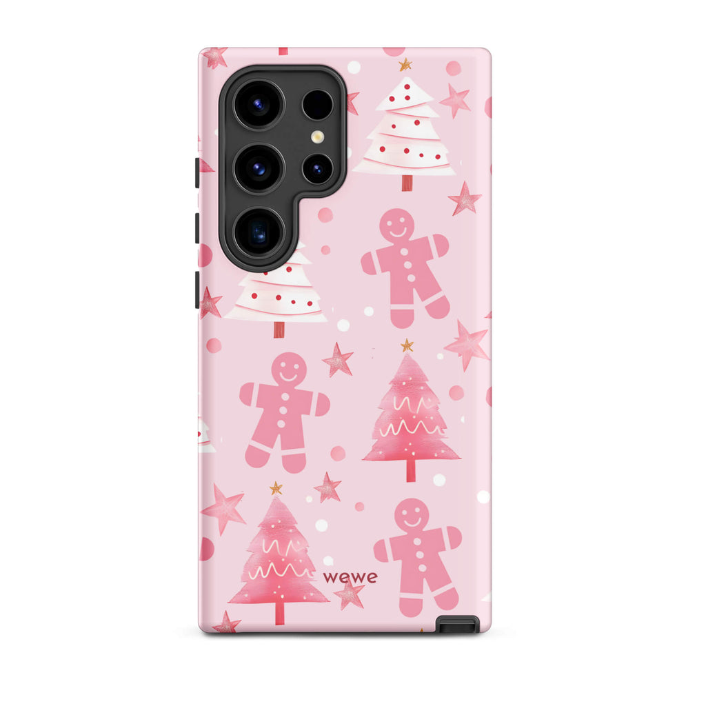 Custom samsung galaxy s24 ultra tough case featuring a soft pastel pink background with a scattered pattern of pink gingerbread men, pink and white Christmas trees, and watercolor pink stars, with 'wewe' branding at the bottom.