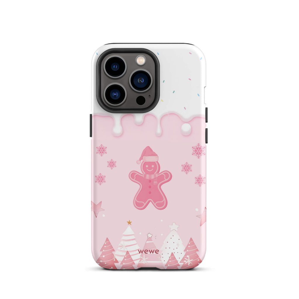 Custom iPhone 13 pro tough case featuring a white top panel with colorful sprinkles and a pink icing drip border, showcasing a cute gingerbread man wearing a Santa hat, surrounded by pink snowflakes and stylized pink/white Christmas trees, with 'wewe' branding at the bottom.