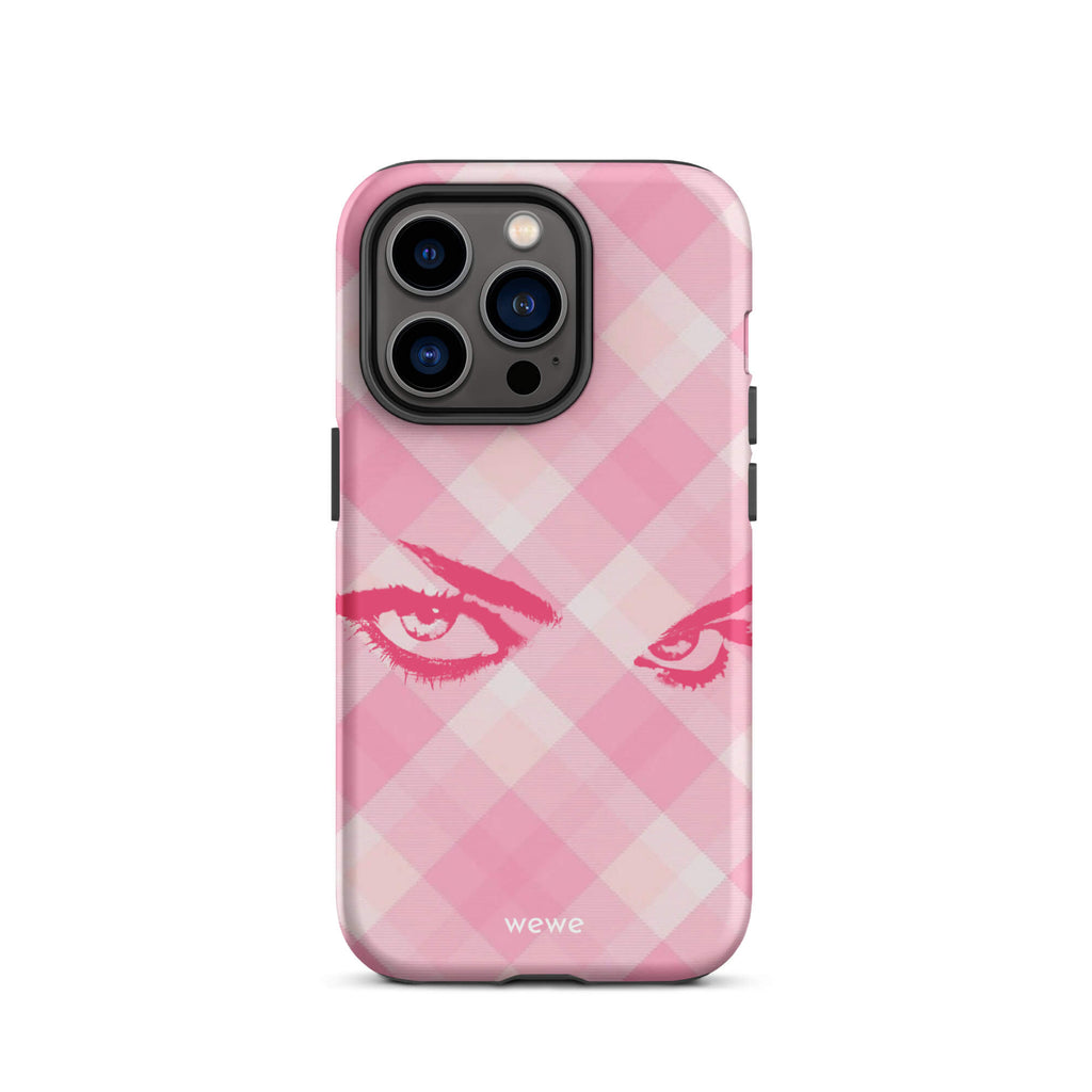 Custom iPhone case 14 pro with a pink and white gingham checkered pattern and a graphic of intense pink eyes.