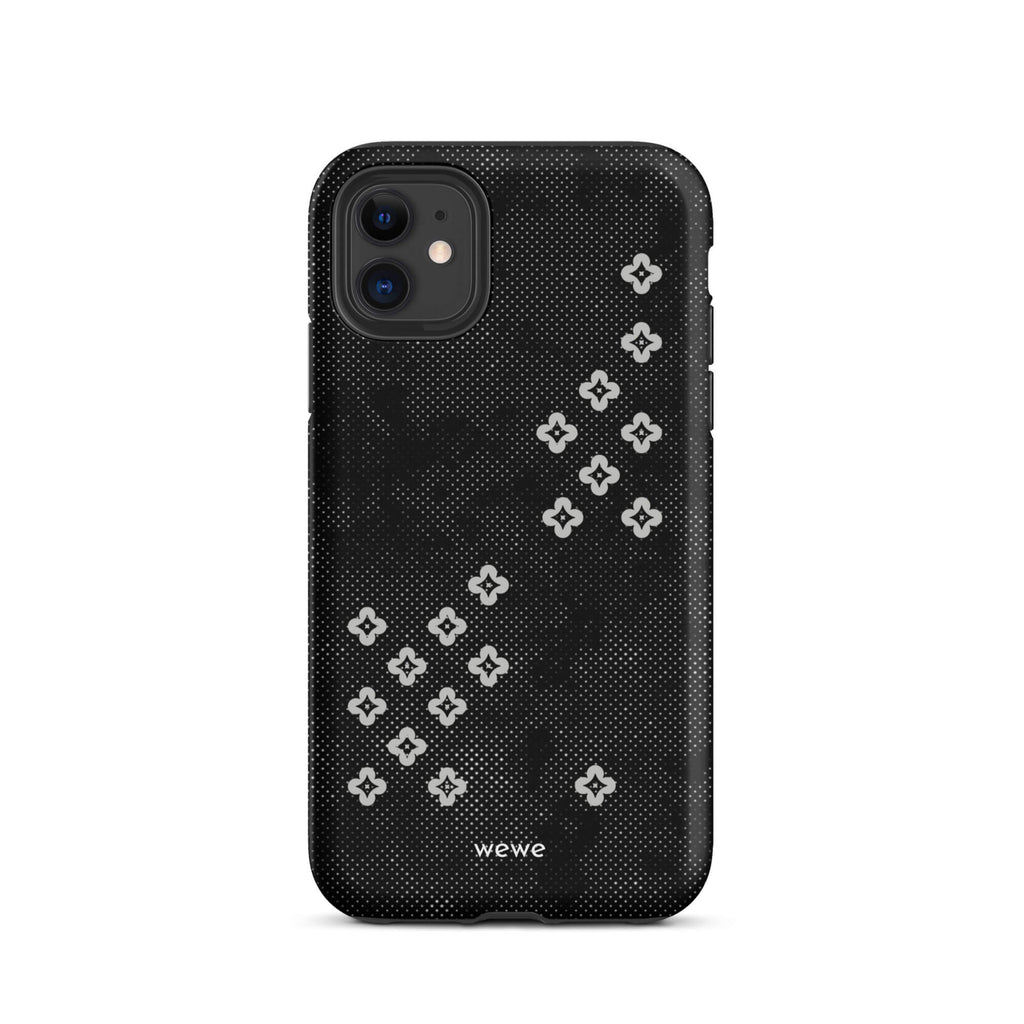 Custom iPhone case 11 with a  black lace background with white plum-style crosses.