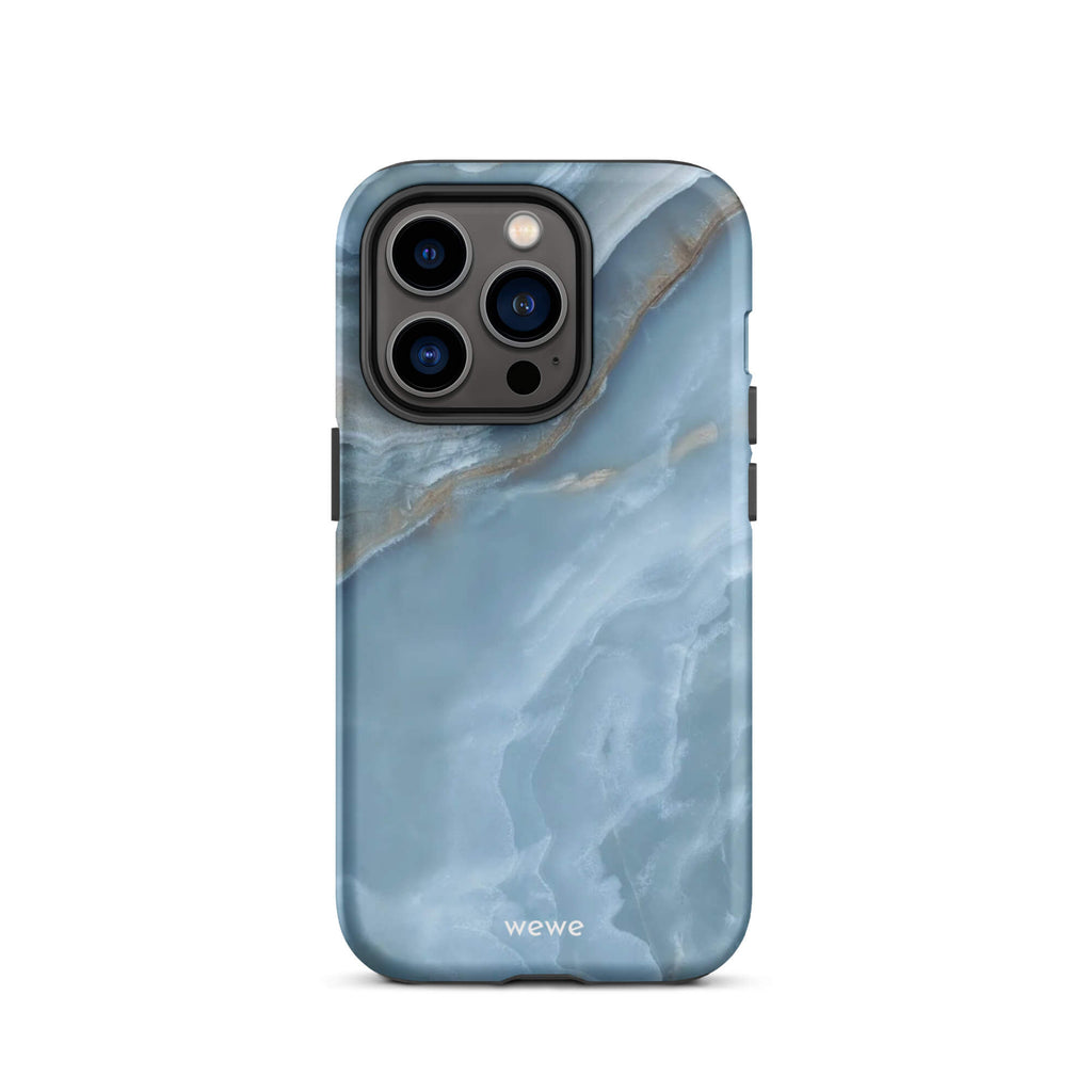 Custom iPhone case 14 pro with a close-up image of a blue, white, and gold marble-like agate slice.