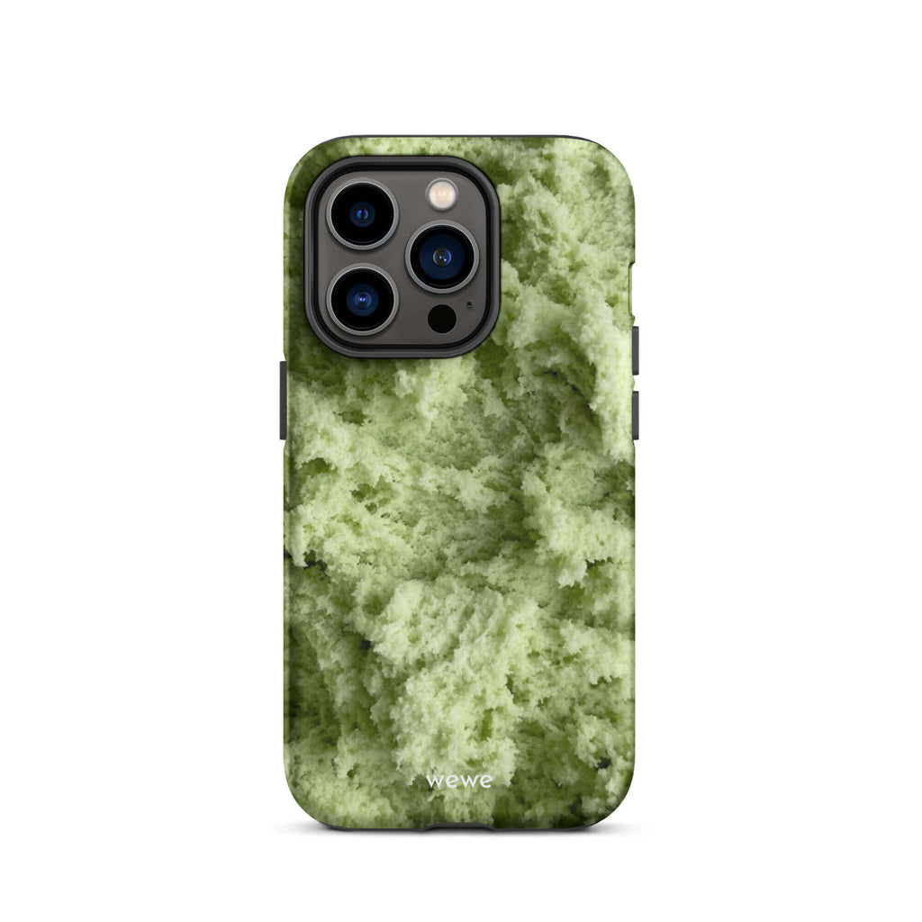 Custom iPhone case 14 pro with a close-up, macro photo of a light green, frothy texture, resembling ice cream or foam.