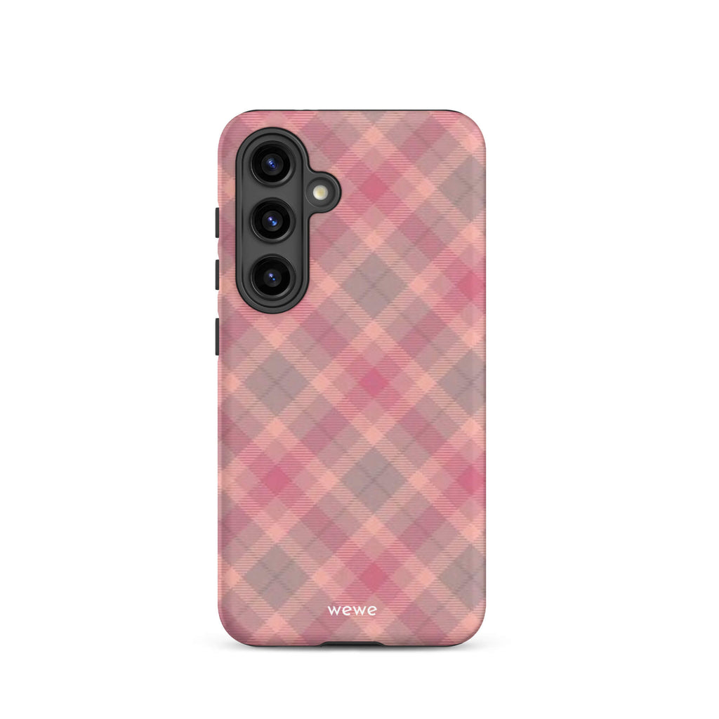 Custom samsung galaxy s24 with a soft, faded checkered pattern of pink, mauve, and gray diagonal lines, resembling a classic tartan plaid.