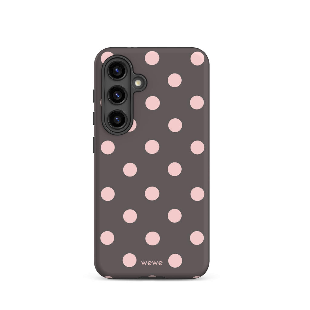 Custom samsung galaxy s24 tough case in matte dark grey/charcoal with large light pink (blush) polka dots and 'wewe' branding at the bottom.