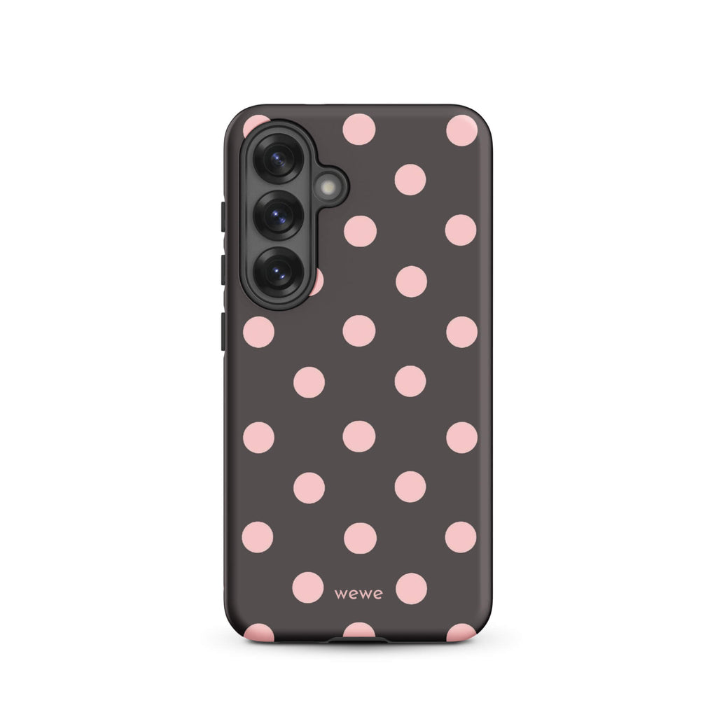 Custom samsung galaxy s25 tough case in matte dark grey/charcoal with large light pink (blush) polka dots and 'wewe' branding at the bottom.