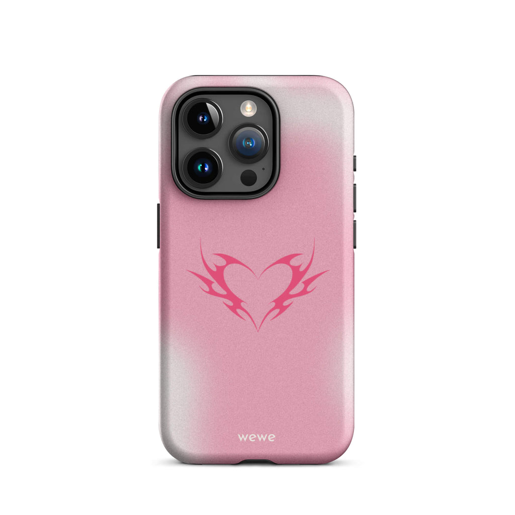 Custom iPhone case 15 pro with a pink and white ombre background and a vibrant pink tribal heart design.