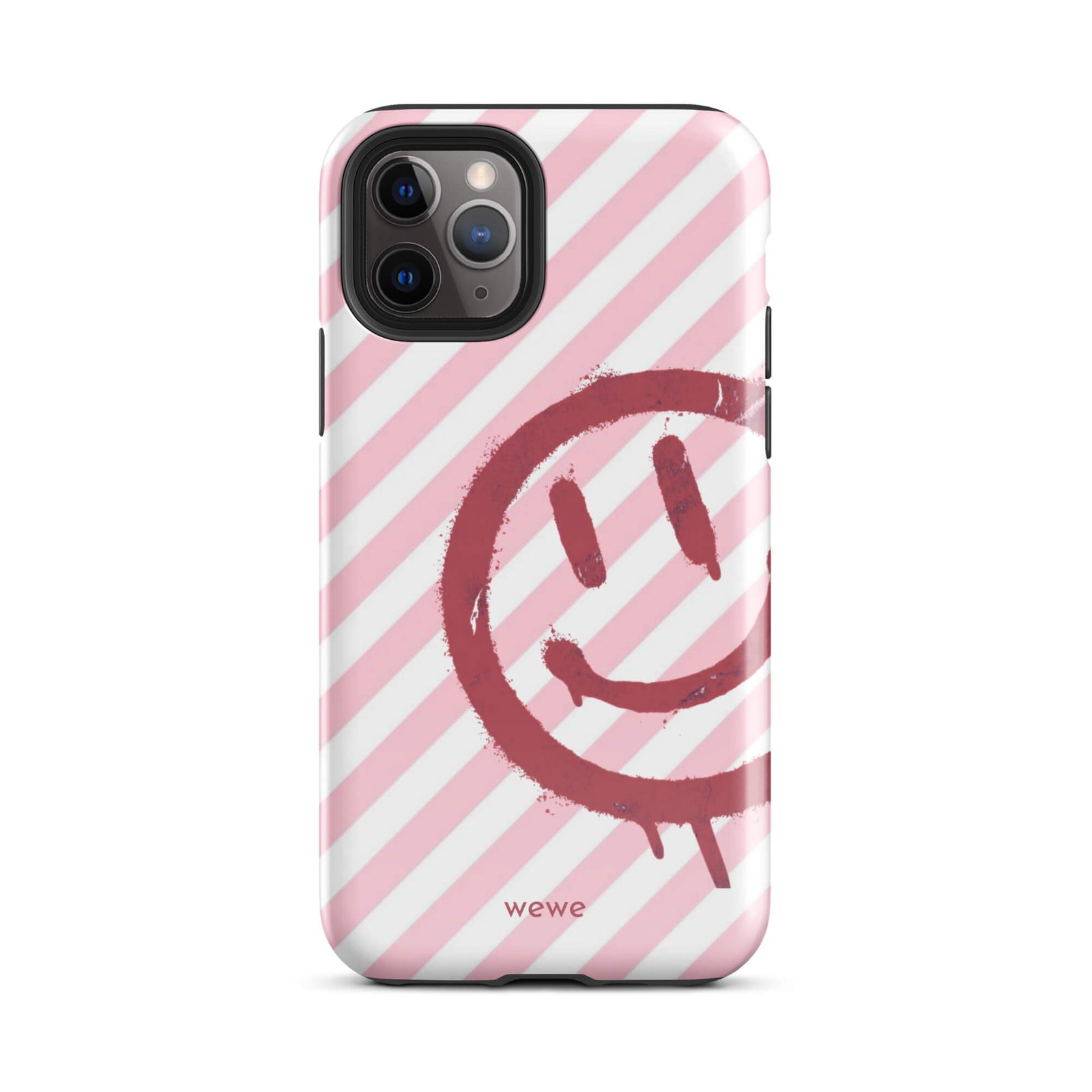 Custom iPhone case 11 pro with a pink and white diagonal stripe background and a red spray paint graffiti smiley face.