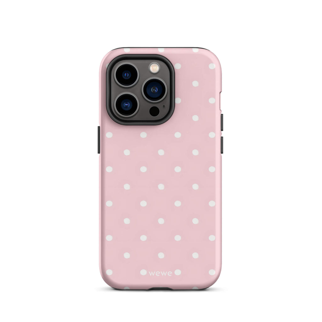 Custom iPhone case 14 pro with a soft pink background and a pattern of small white polka dots.