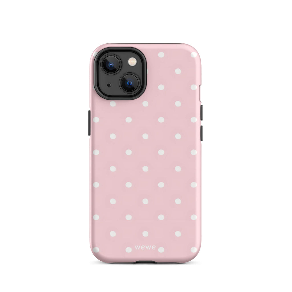Custom iPhone case 14 with a soft pink background and a pattern of small white polka dots.
