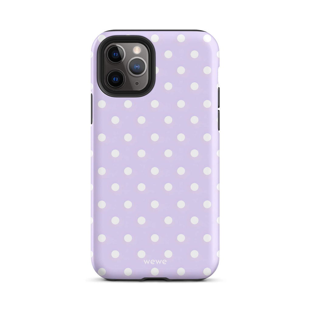 Custom iPhone case 11 pro with a soft purple background and a pattern of small white polka dots.