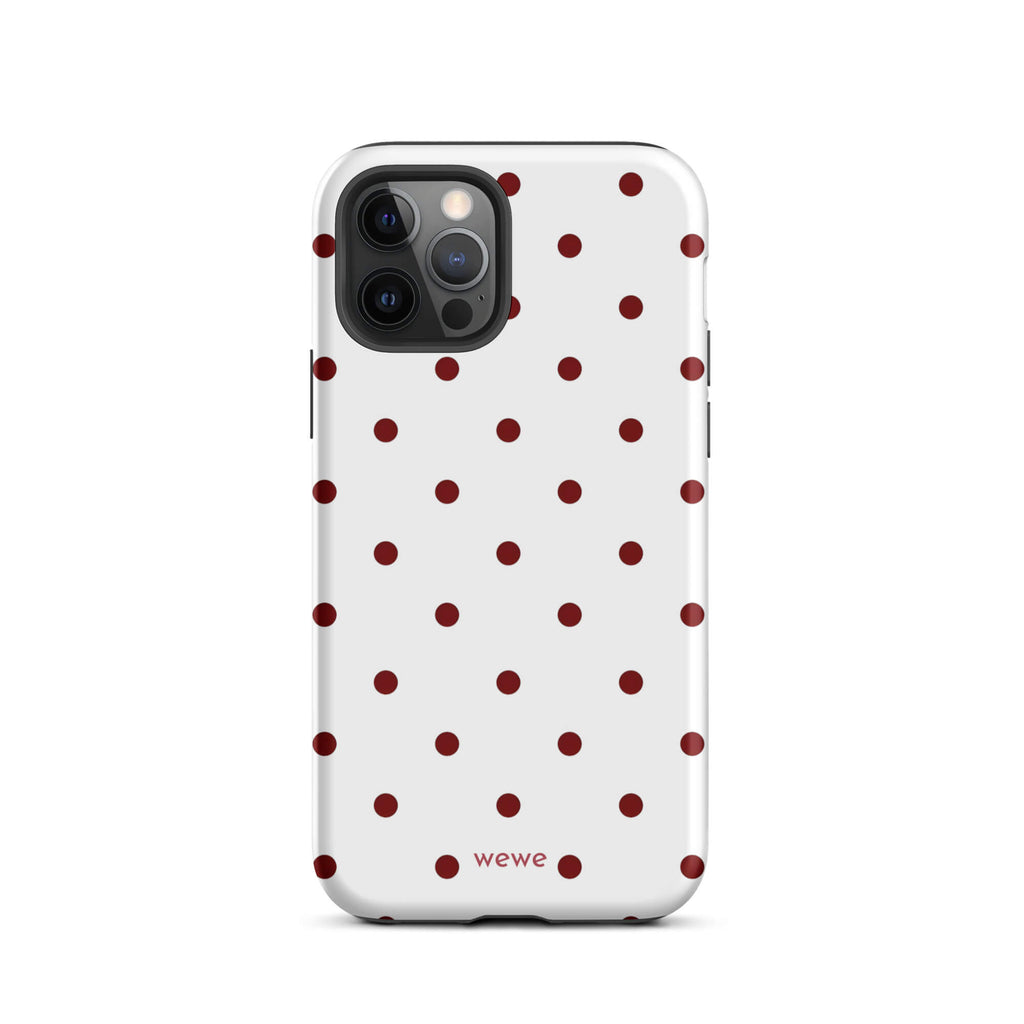 Custom iPhone case 12 pro with a  clean white background and a classic pattern of small, maroon red polka dots.