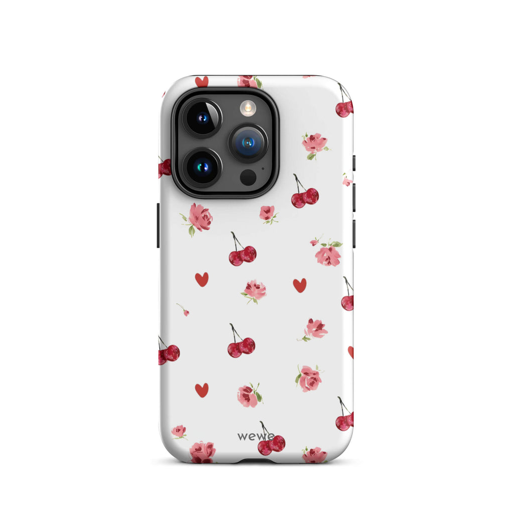 Custom iPhone case 15 pro with a cute and whimsical pattern of watercolor roses, hearts, and cherries on a white background.